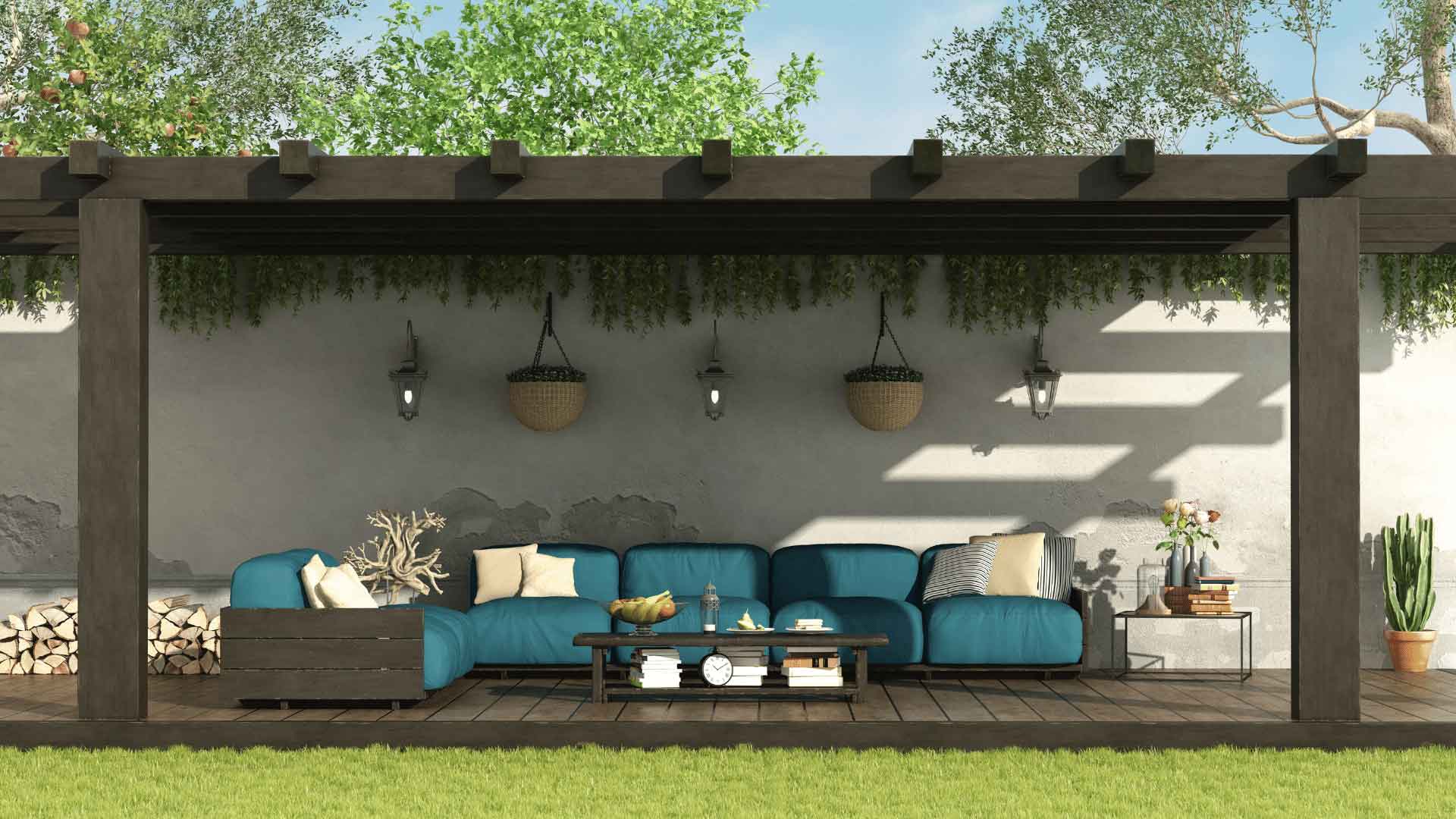 Timber pergola over an outdoor lounge area with teal sofas and hanging plants