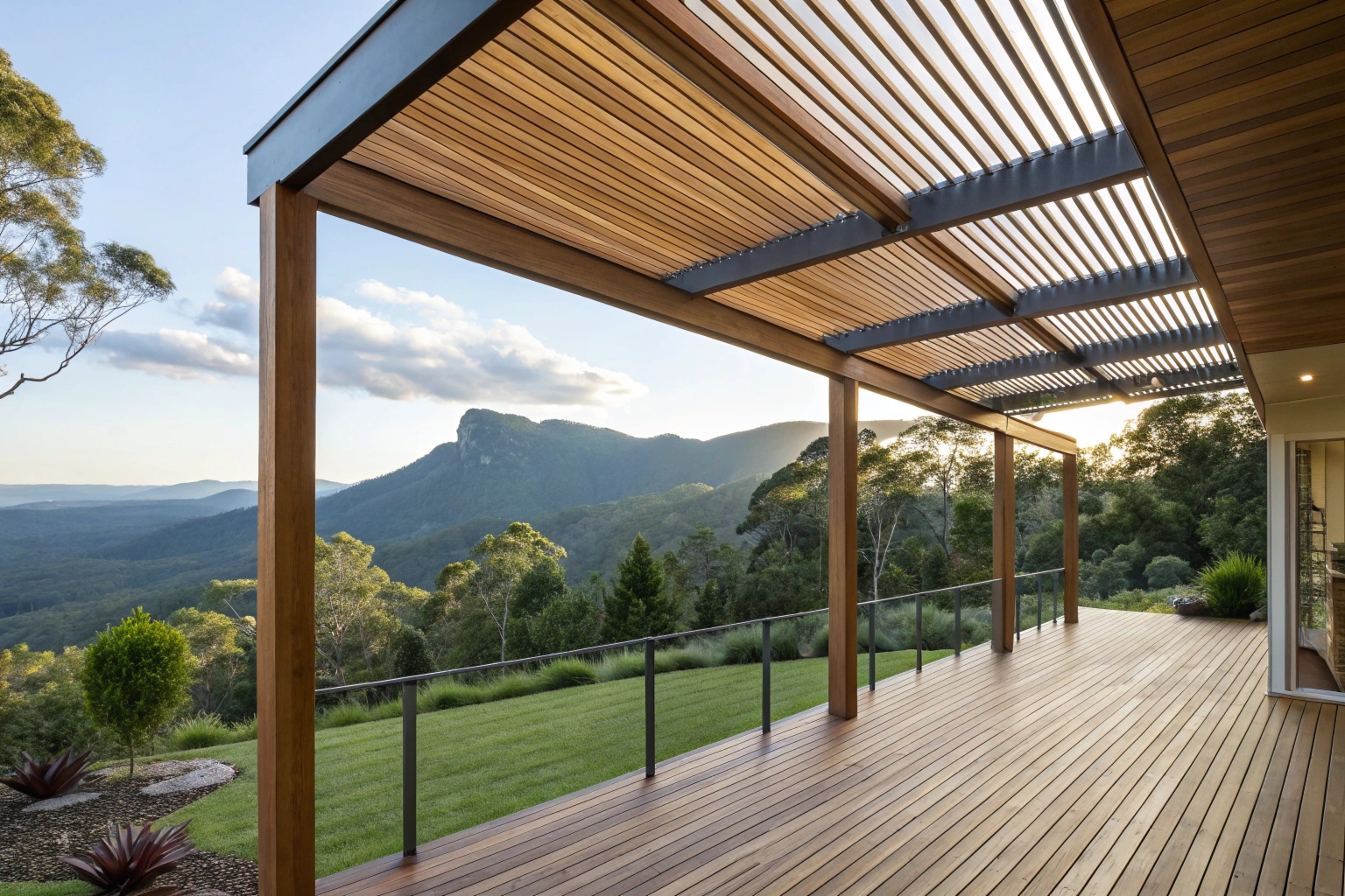 Modern timber pergola covering a wooden deck with mountain views