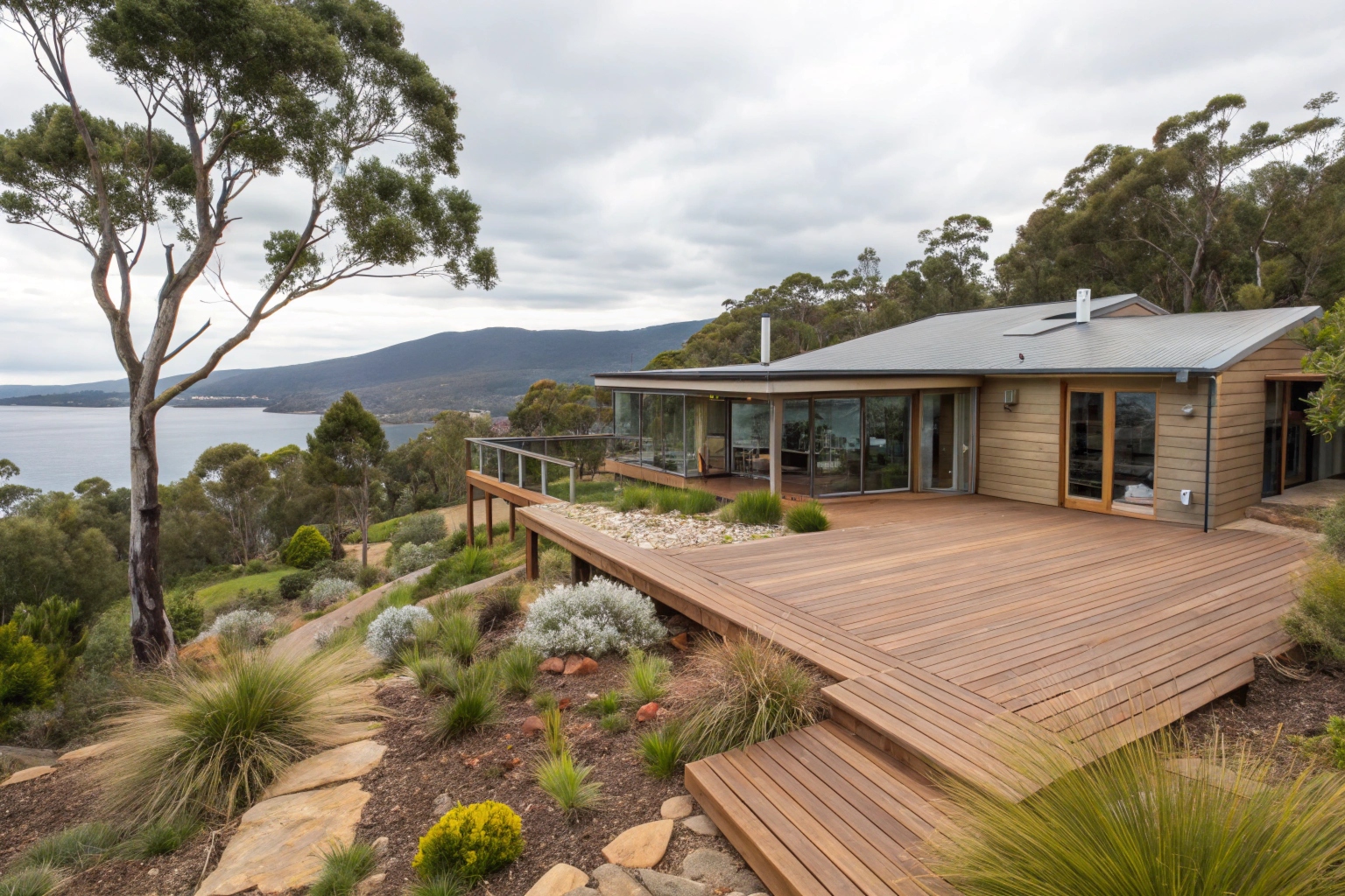 Wraparound timber deck on coastal Hobart property